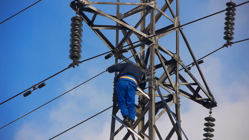 Cable works on the high voltage electricity pylon. 