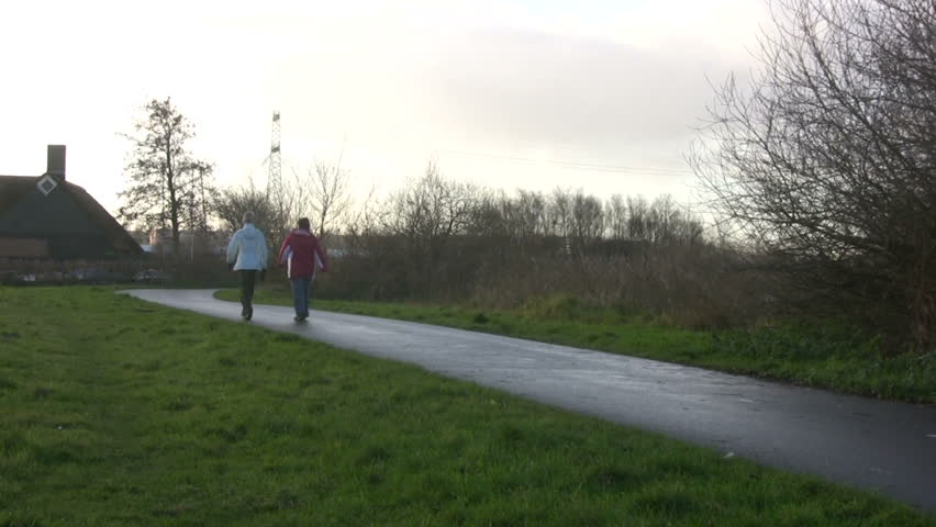 Women walk in nature preserve