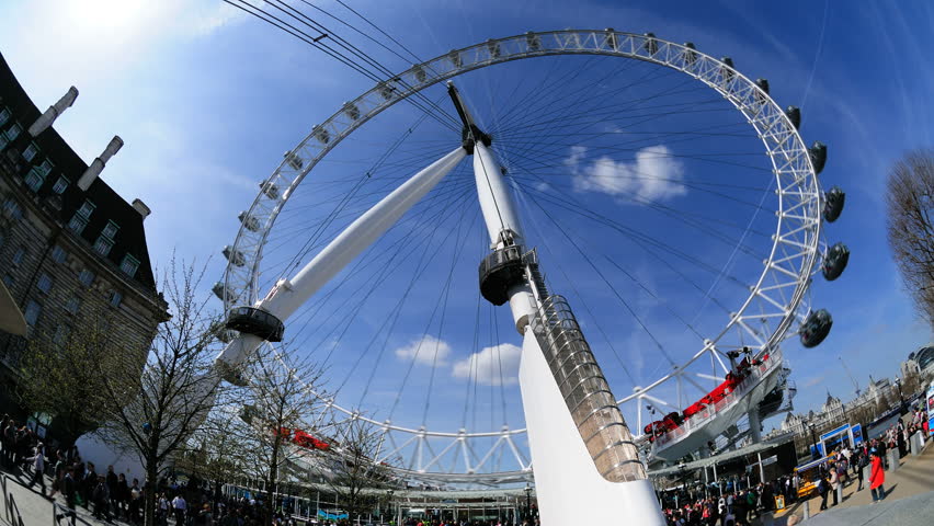LONDON, ENGLAND - JUNE 2:Time-lapse view of London Eye at night on June 2, 2010 in London, England The London Eye is one of the UK's leading tourist attractions with 3.5 million visitors every year. l