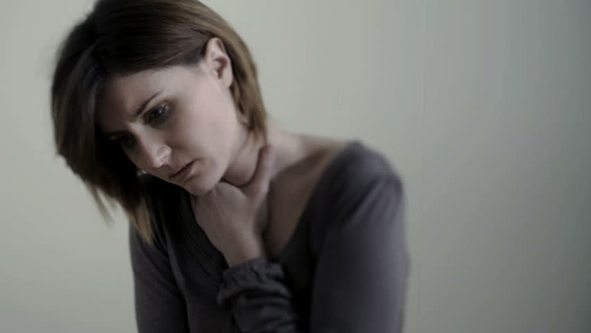 Sad/Despairing Woman, maybe victim of violence;  HD Photo JPEG