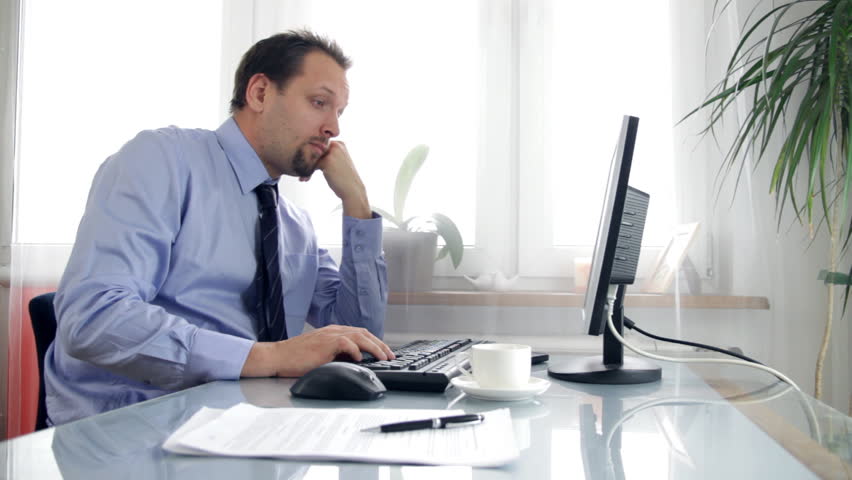 Businessman taking a nap in the office