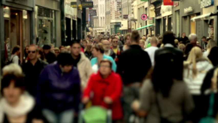 Slow motion crowd in shopping street blurred Shopping street filled with people. Filmed in slow motion. Faces are blurred and logo's have been digitally replaced.