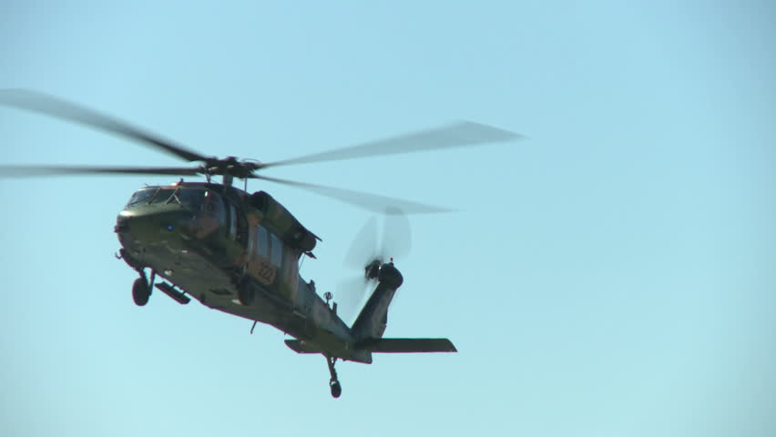 An army Blackhawk helicopter coming in to land