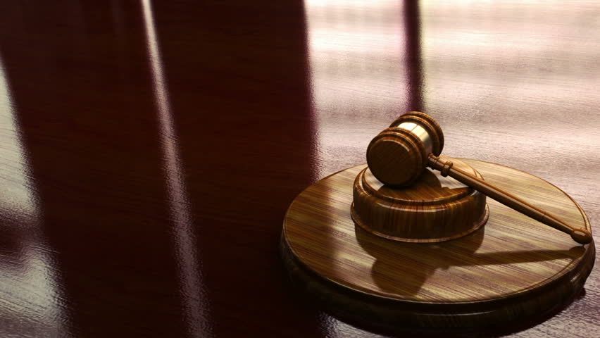 Judge gavel with lighted background looping animation