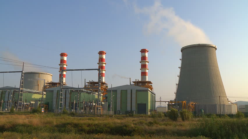 Power plant smokestacks time lapse