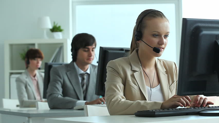 Row of call center operators at work