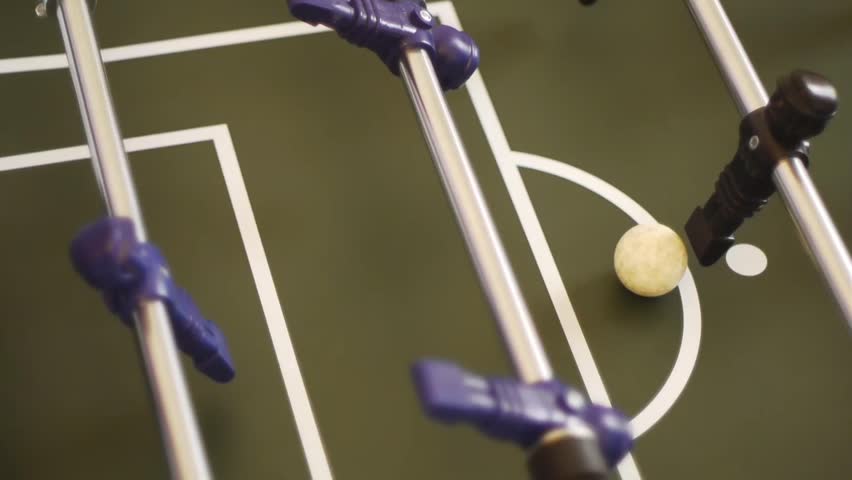 table soccer - a penalty shot is given and a figure in the front row makes a goal