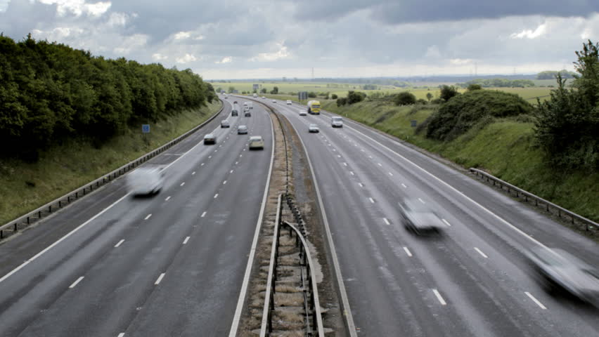 Timelapse of traffic on both carriageways of a British motorway. Easily flipped to show traffic driving on right hand side.