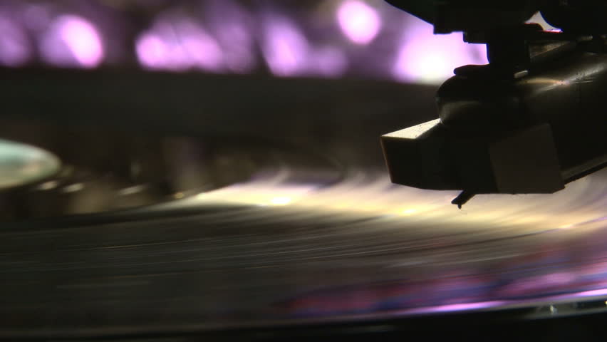 Record player, dark, old style . Rotate. Violet, purple color.