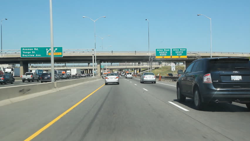 TORONTO, CANADA - JULY 14: Driving on Highway 401 in Toronto on July 14th, 2011. The segment of Highway 401 passing through Toronto is the busiest highway in North America.