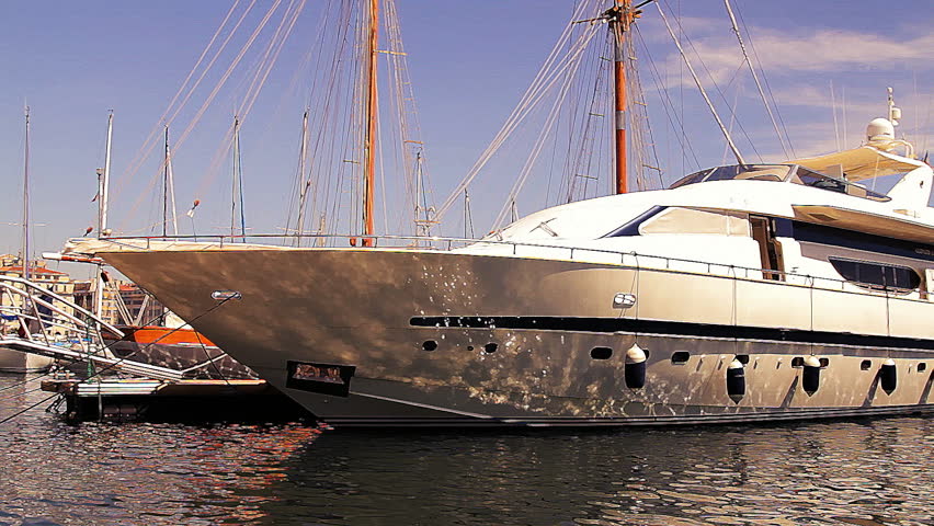 a large luxury yacht in marseille's vieux port harbour, france