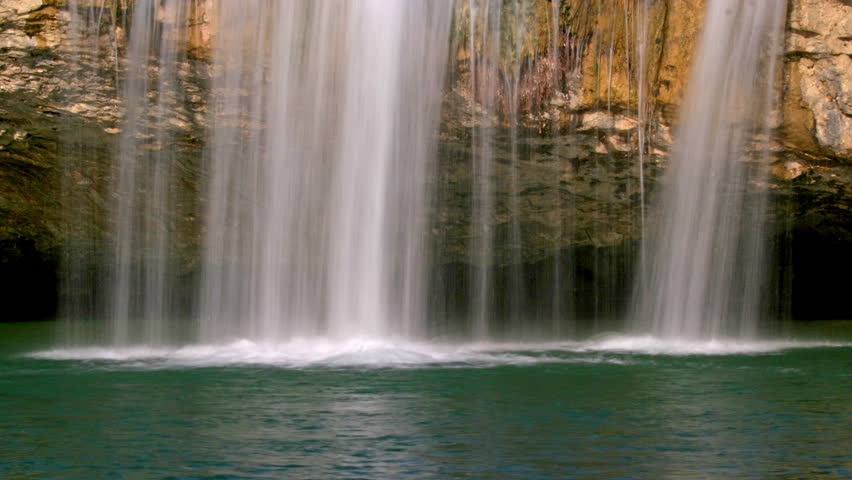 Waterfall and lake Zarecki krov with the trees, shot with the tracks