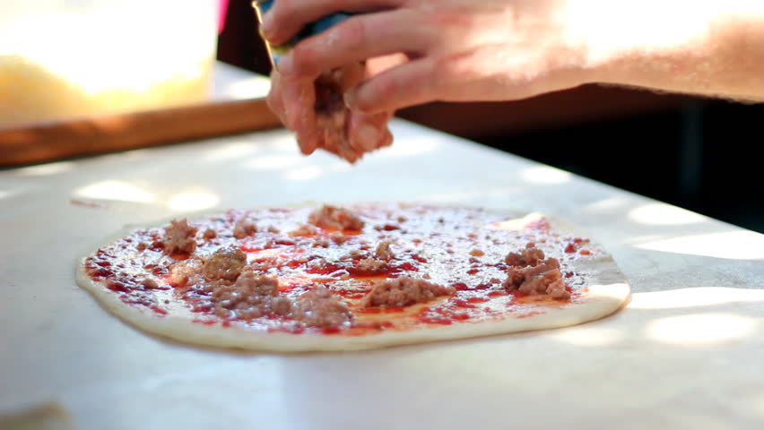 Chef preparing a pizza. HD 1080i.