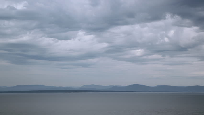 Stormy Clouds. Timelapse. Timelapse sequence of clouds over the St. Lawrence seaway. View from Riviere-du-Loup in Quebec, Canada . 