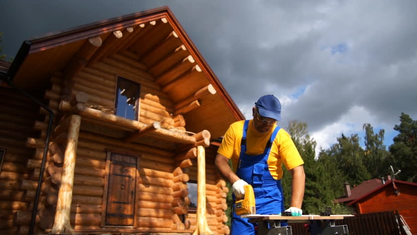 Woodworker with saw