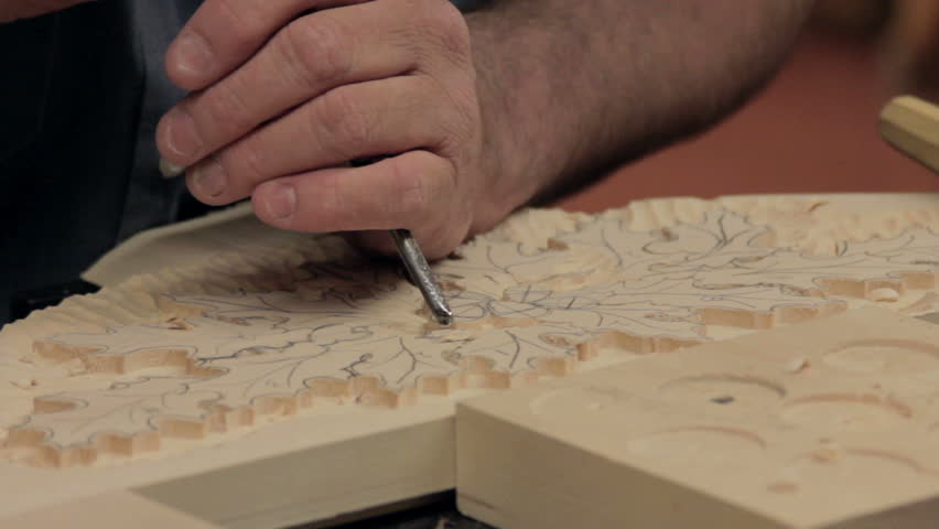 Wood carver working