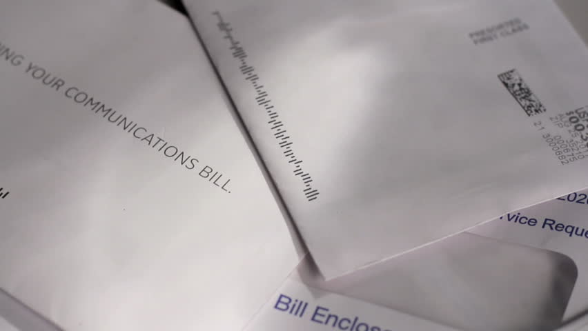 Dolly shot over unpaid bills