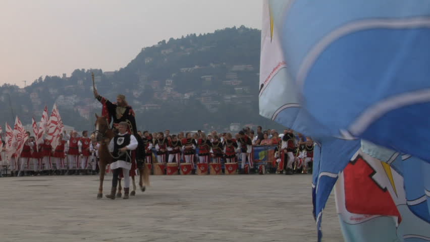 COMO, ITALY - CIRCA SEPT 2011:  Palio del Baradello re-enacts Barbarossa's visit to his allies in Como after defeating Milan in the 1159 battle, circa Sept 2011, Como, Italy. Period dances, games and shows create a medieval atmosphere at this annual event