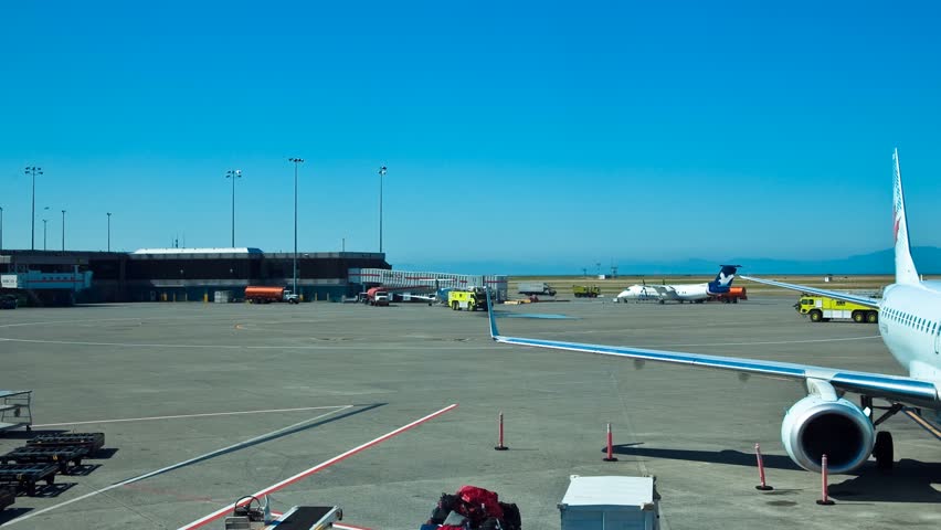VANCOUVER CANADA - CIRCA AUGUST 2011: (Timelapse View) Airport tarmac at Vancouver International Airport, circa August 2011, Vancouver, Canada.  