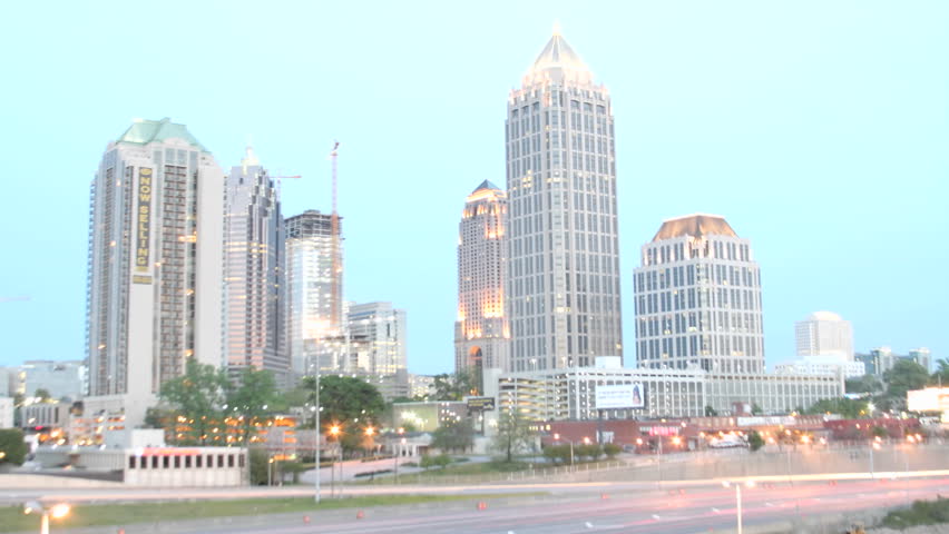 Lights illuminate downtown Atlanta, Georgia as the evening fades into night.