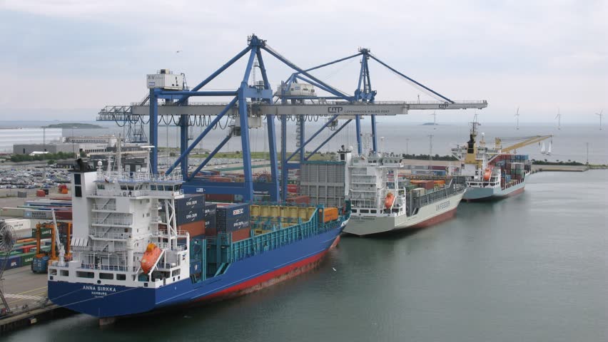 COPENHAGEN, DENMARK - JULY 12: Freight ships at terminal on July 12, 2011 in Copenhagen, Denmark. Copenhagen port has cargo traffic of 7400 millions of tones yearly.