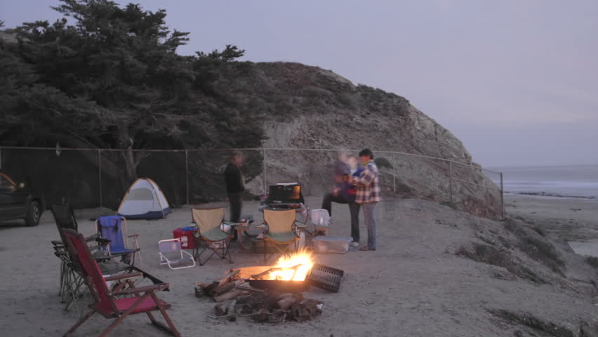 Time lapse of people around a campfire at Jalama Beach County Park, California.