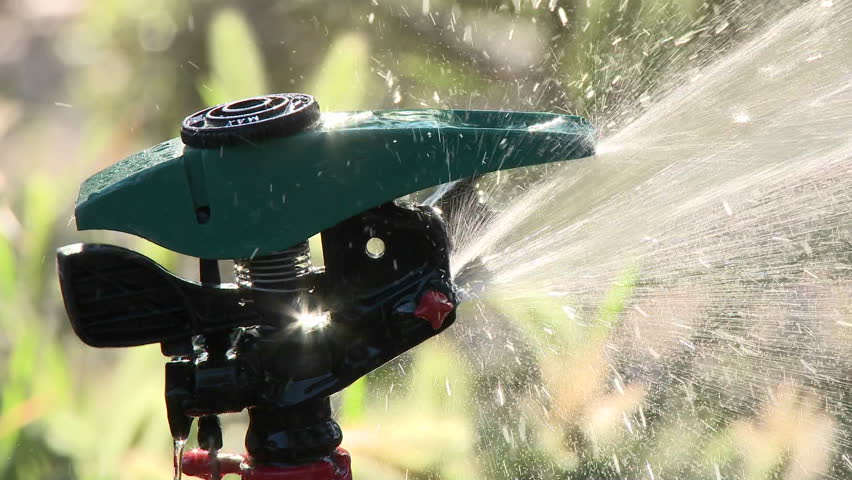 Close-up on a sprinkler shutting off in Oak View, California.