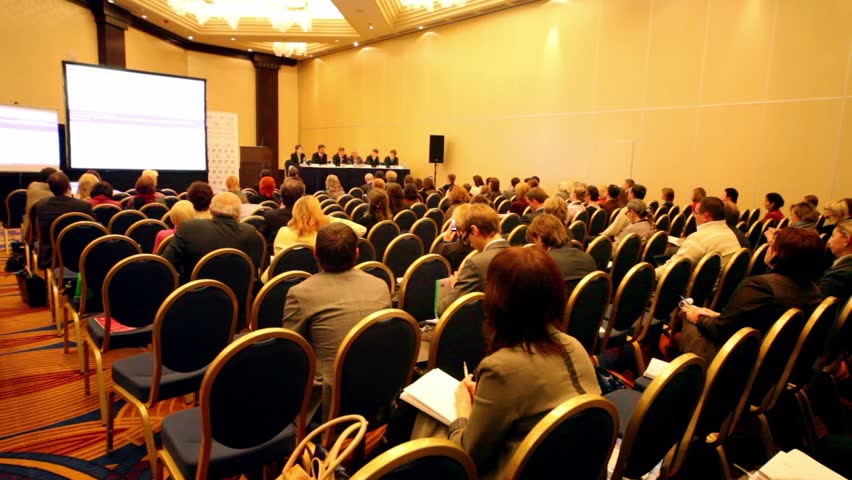 MOSCOW - DECEMBER 16: People seated in auditorium watch presentation during International Tax Congress TaxExpo-2010 on December 16, 2010 in Moscow, Russia.