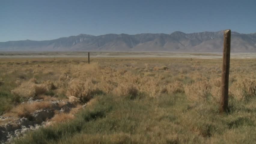 Pan across the Owens Valley to the Sierra Nevada Range near Lone Pine, California.