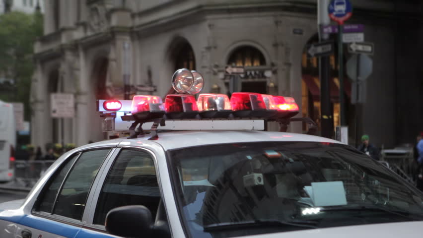 a NYC squad car with it's lights flashing at a check point in lower Manhattan near the 'occupy Wall st' protests, October 2011.
