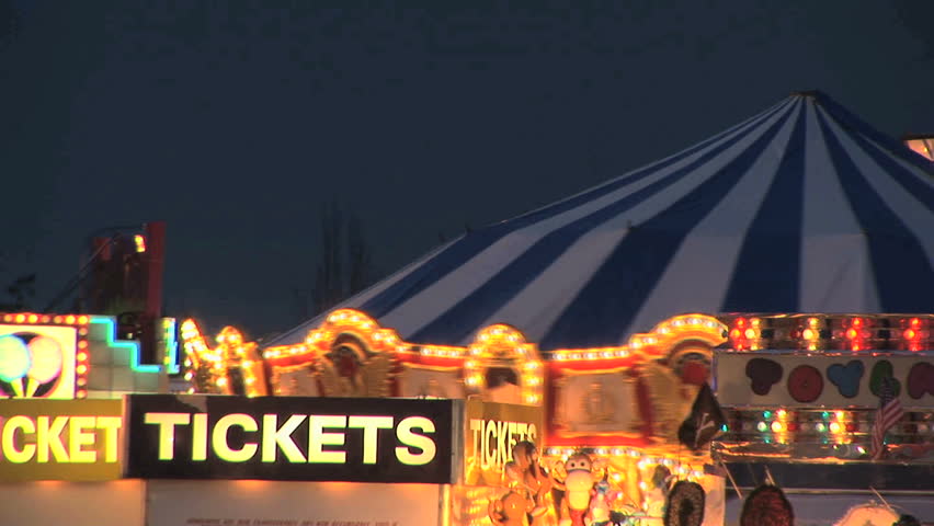 Carousel and ticket booth at a carnival