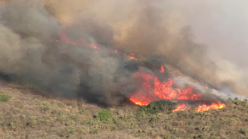 WS of wildfires burning on a hillside in southern California.