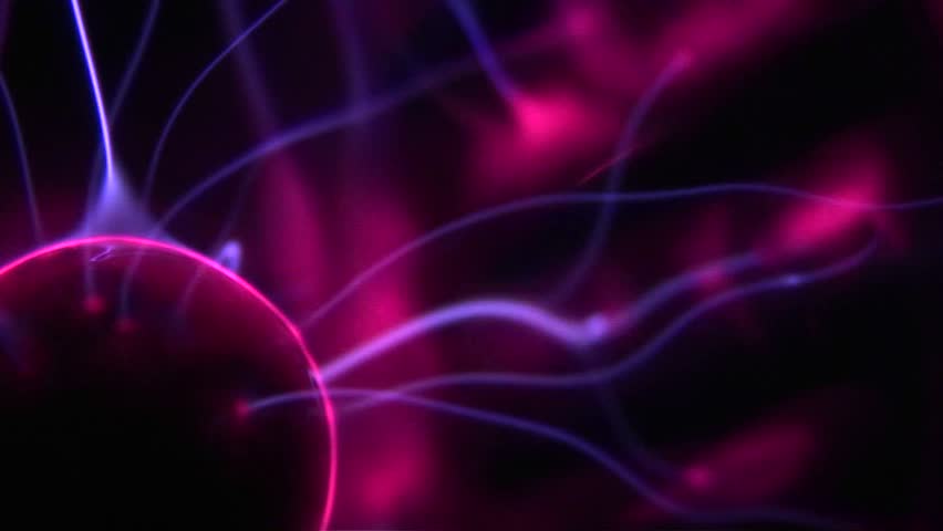 Electrical beams shoot off of a tesla coil in psychedelic fashion