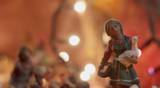 figurine of a peasant girl in a Christmas nativity scene