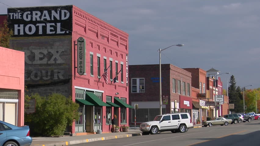 BIG TIMBER, MONTANA - CIRCA 2009: People walk along a street in a quaint Western town.
