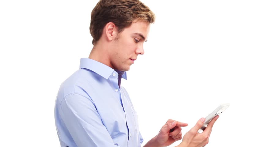 Young businessman wearing blue shirt is holding a calculator and smiling, isolated on white background