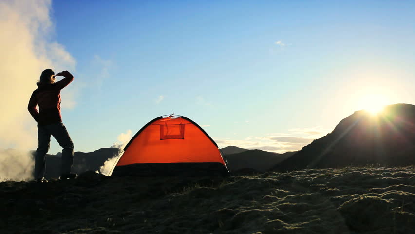 Female Hiker Watching the Sun Rising