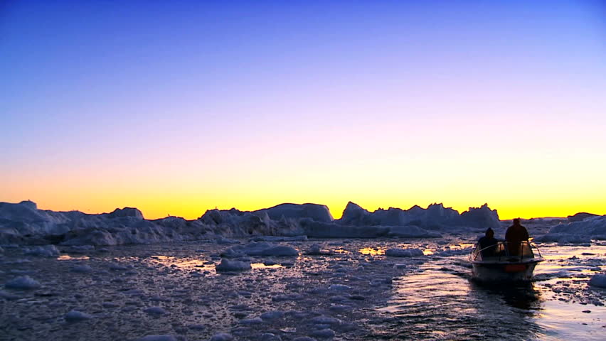Vessels at Sunset in Ice Floes with Icebergs