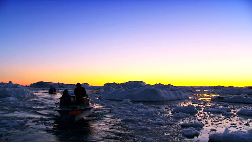 Vessels at Sunset in Ice Floes with Icebergs