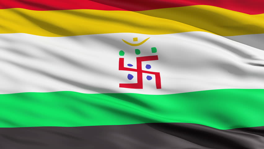 Jain Flag. Jainism is an Indian religion that advocates non-violence. There is the swastika in the centre of the flag. It represents the four states of existence of life. 