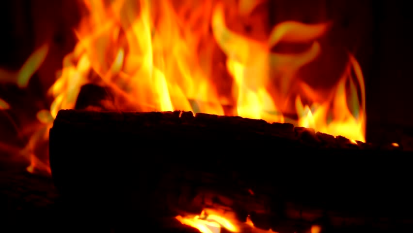 Burning flames in the fireplace
