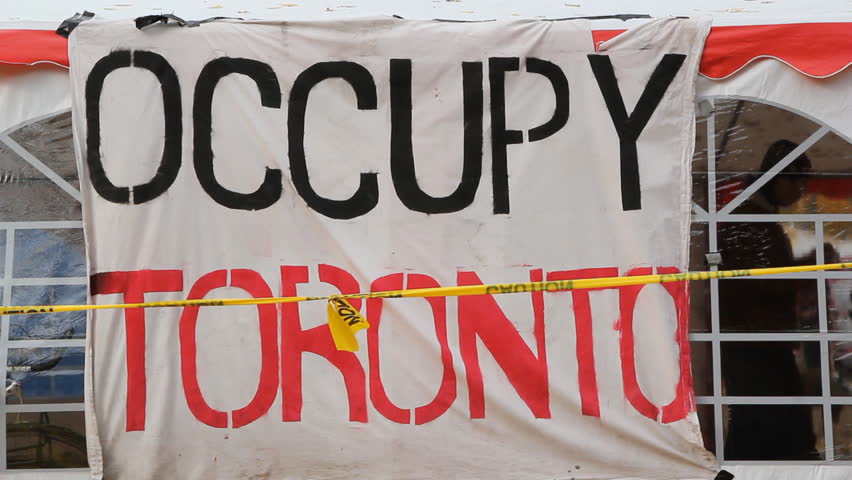TORONTO, ONTARIO - NOV 10th: Sign at Occupy Toronto on Nov 10th, 2011, Toronto, Ontario, Canada. Two shots. The site was closed down on Nov 23rd by police following a superior court judge ruling.