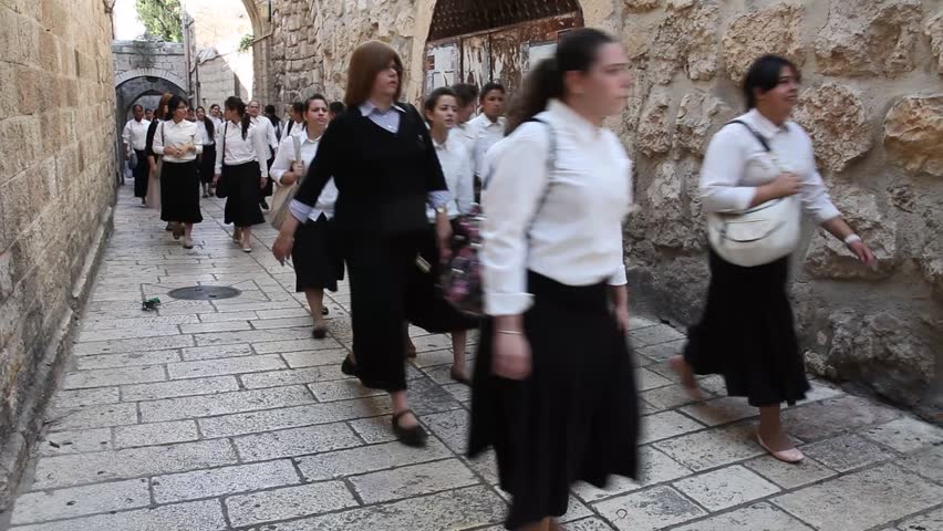 JERUSALEM, ISRAEL - CIRCA OCT 2011: Jewish school girls head towards the Western Wall before Yom Kippur circa October 2011 in Jerusalem.