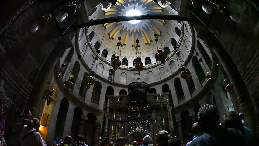 JERUSALEM, ISRAEL - CIRCA OCT 2011: Visitors observe the Rotunda and the Edicule in the Church of the Holy Sepulchre circa October 2011 in Jerusalem.