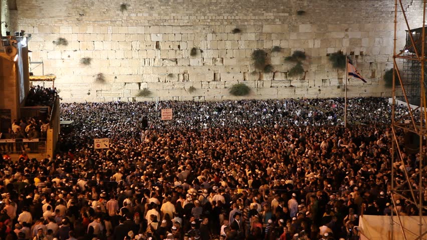 JERUSALEM, ISRAEL - OCT 6, 2011: Thousands of Jews recite Slihot by the Western Wall on October 6, 2011 in Jerusalem.
