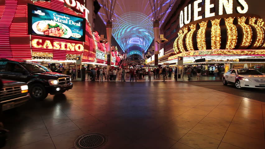 LAS VEGAS CIRCA 2011: Fast motion of traffic and tourists on Fremont Street downtown in Las Vegas, Nevada at night.