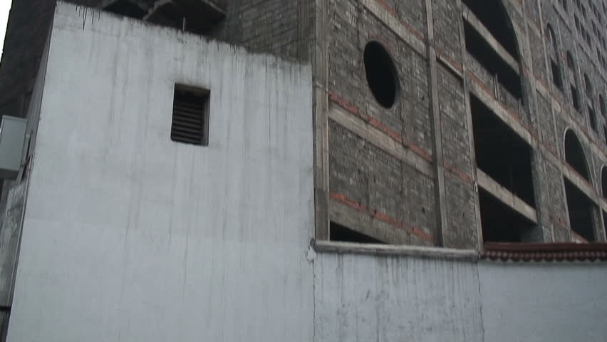 Pan Up: Communist Concrete Building, China