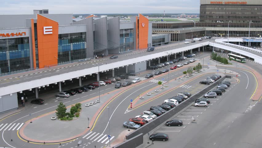 MOSCOW - SEPTEMBER 22: (Timelapse View) Cars drive to and from terminal E on Sheremetyevo airport on September 22, 2011 in Moscow. 