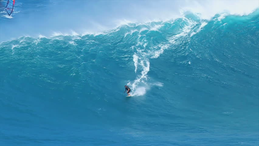 MAUI, HI - MARCH 13: Professional surfer Laird Hamilton rides a giant wave at the legendary big wave surf break known as "Jaws" during one the largest swells of the winter March 13, 2011 in Maui, HI.