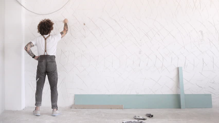 Funny Curly Man Wears Pants With Suspenders Making Sport Exercises White Painting Wall Squats Stock Footage Video 18026461 Funny Curly Man Wears Pants With Suspenders Making Sport Exercises White Painting Wall Squats Stock Footage Video 18026461
